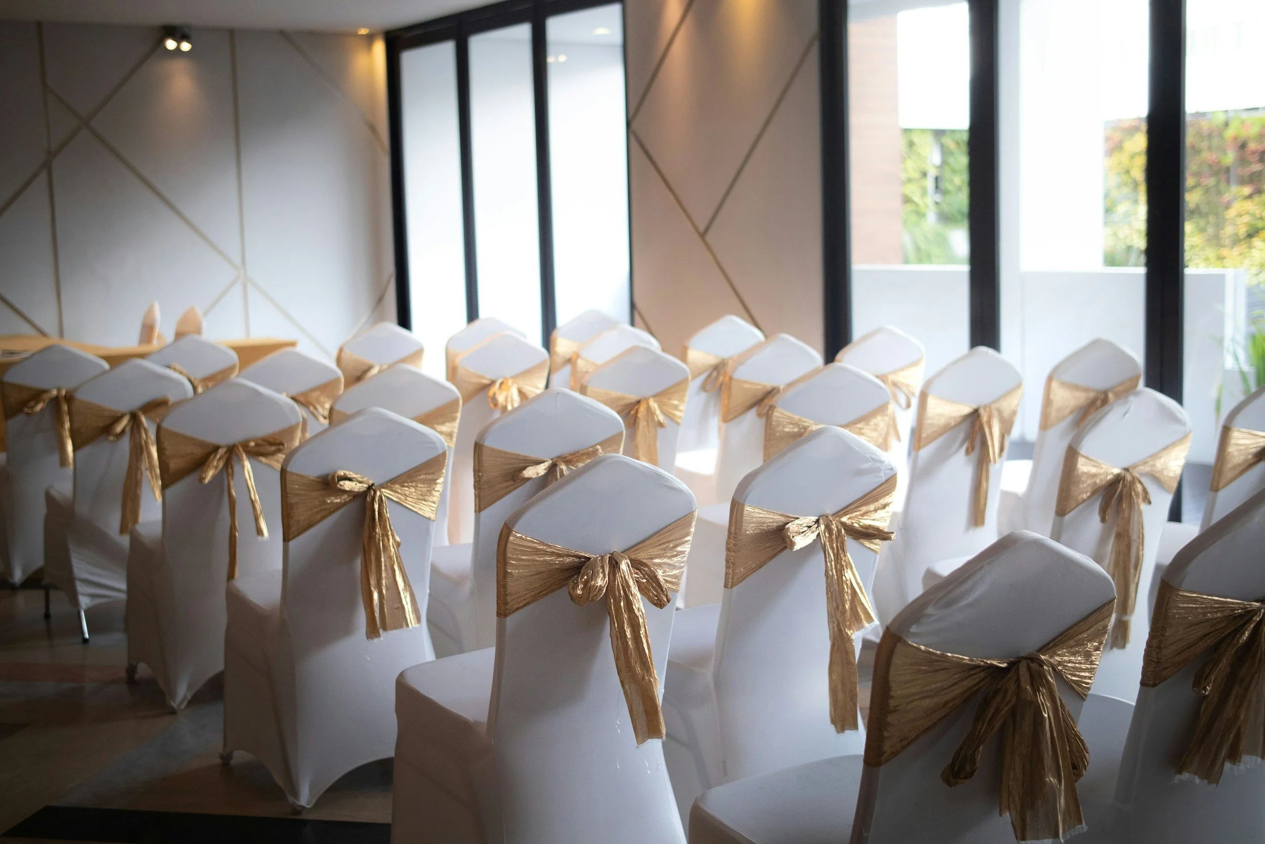 chairs with gold bows Contact Us